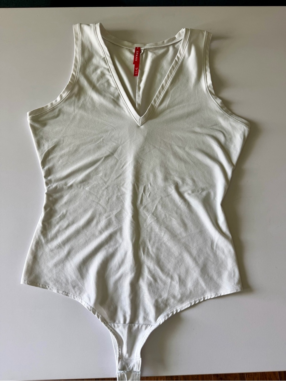 SPANX White V-Neck Sleeveless Bodysuit